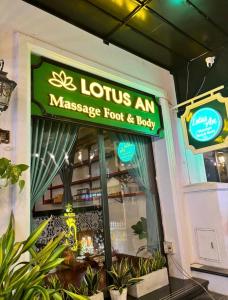 a sign on the front of a massage foot and body at lotusan in Phú Quốc