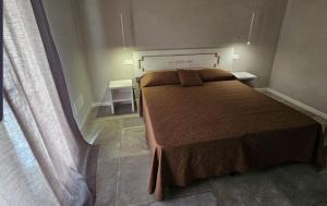 a bedroom with a large bed in a room at Villa Altea Boutique Hotel in Terranuova Bracciolini