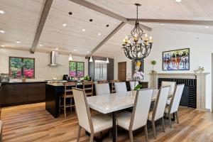 a dining room and kitchen with a table and chairs at Casa Alegria in Santa Barbara