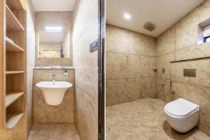 a bathroom with a toilet and a sink at Luxury Hotel Aura Residency in Rāiwāla