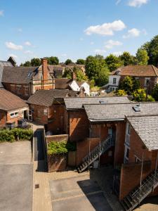 an aerial view of a town with houses at Comfortable Apartment set in an Old Mill in Westbury