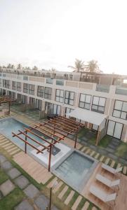 an overhead view of a building with a pool at Atins Ville Lençóis in Atins +6 photos
