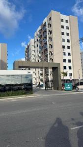 an empty street in front of a large building at Lunar Prime Aruana in Aracaju