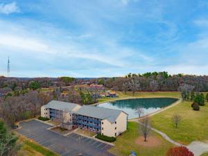 an aerial view of a building with a pool at Club Wyndham Tamarack in Wisconsin Dells