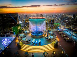 an aerial view of a restaurant on the top of a building at Steigenberger Phnom Penh in Phnom Penh