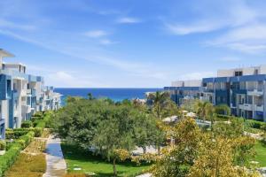 a view of the ocean from a resort at Fouka Bay Holiday Apartments By BlueKeys in Marsa Matruh