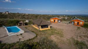 an overhead view of a house and a swimming pool at Cuchac Cuchic in Las Compuertas +24 photos