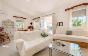 a living room with a couch and a table at Awesome Home In Abarán in Abarán