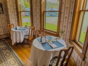 two tables in a room with two windows at The Governor's Inn in Ludlow +27 photos