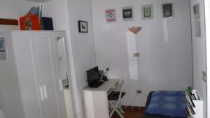 TV a/nebo společenská místnost v ubytování Barcola Holidays Casa Vacanze