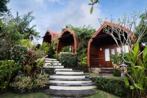 a set of stairs leading up to a house at Druwa Bali in Uluwatu