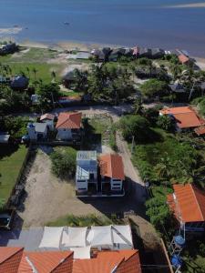 an aerial view of a house in a resort at Villa Fênix Suítes in Barreirinhas