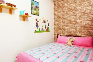 Voodi või voodid majutusasutuse Time Travelodge Homestay toas