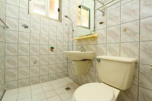 Vannituba majutusasutuses Time Travelodge Homestay