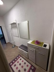 a dressing room with a mirror and a dressing table at Old Town view apartment in Bar