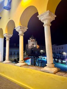 a view of a city at night at Villa Nooma Elvas in Elvas