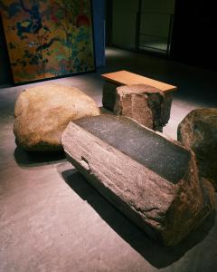 a group of rocks and a table in a room at hotel androoms Kyoto Shichijo in Kyoto