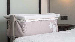 a close up of a bed in a room at Alcola Boutique Villa - Dania Unit in Tlekung +21 photos