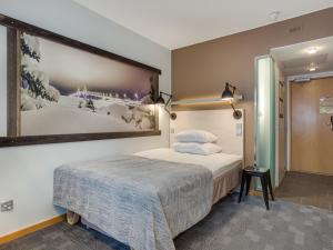 Säng eller sängar i ett rum på Original Sokos Hotel Vaakuna Vaasa