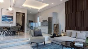 a living room with a couch and a table at Alcola Boutique Villa - Astonia Unit in Batu