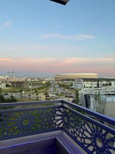a view of the city from a balcony at Appart Hôtel Stade Tanger in Tangier