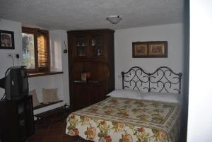 Postel nebo postele na pokoji v ubytování B&B Il Torchio