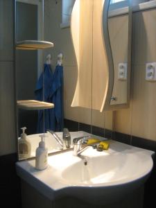A bathroom at Viktória&Krisztián Apartments