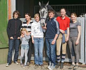 a group of people standing next to a horse at Ponyhof Naeve am Wittensee in Groß Wittensee