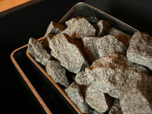 a tray of rocks sitting on a table at FOG villa&spa in Kirishima