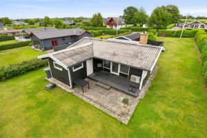 an overhead view of a small house in a yard at Nordic Style Summer House For Two in Bogense