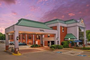 a hotel building with a parking lot in front at Comfort Inn Douglasville - Atlanta West in Douglasville