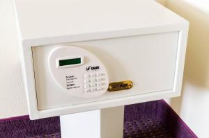 a microwave oven with a thermometer on it at Quality Inn & Suites Colby in Colby