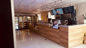 a fast food restaurant with a counter and a counter at mh town in Ulaanbaatar