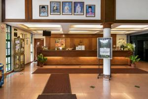 a large lobby with a waiting room with at Sunday Residence Inn Cherating in Cherating +74 photos