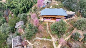 an overhead view of a house on a hill at Homstay A Lệnh in Sơn La