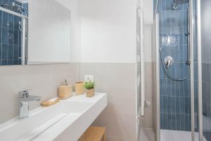 a bathroom with a sink and a shower at Ciasa Cianins in San Vigilio Di Marebbe +54 photos