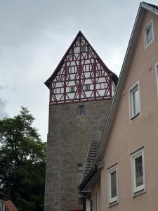 a tower on top of a building at Ankerplatz in Münnerstadt