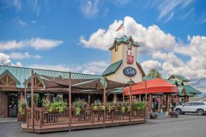 a building with a clock tower on top of it at Best Western Plus GranTree Inn in Bozeman