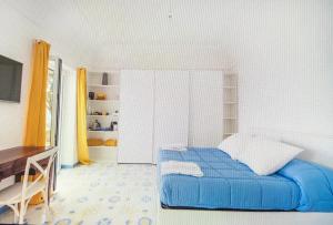 Cama o camas de una habitación en Suite Paradiso