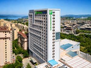 an overhead view of a tall white building at Holiday Inn Express Zhangye by IHG in Zhangye