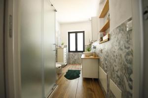 a bathroom with a sink and a toilet in a room at Casa Vacanza La Torre in Paratico +79 photos