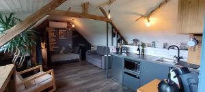 a kitchen with a sink and a counter top at Chez Walter et Camille in Saint-Cernin-de-Larche