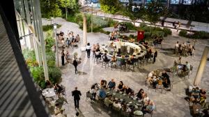 an overhead view of a crowd of people sitting at tables at Jacob Modiin in Modi'in-Maccabim-Re'ut