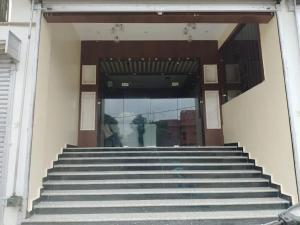 a set of stairs in front of a building at Hotel lakshmi in Goddā