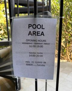a sign that says pool area opening hours at Il Sogno di Angelo - Blevio in Blevio