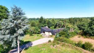 an aerial view of a house on a hill at Maison Nature Bretagne 3 chambres Plain-Pied in Langonnet
