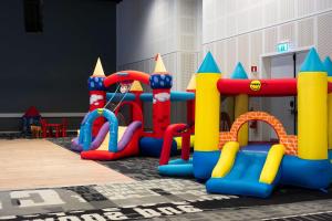 a childrens play area with a play equipment in a room at Scandic Stavanger Forus in Stavanger