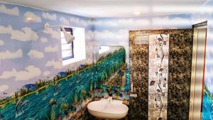 a bathroom with a sink and a mirror at Sri Ram Villa in Rāmeswaram +60 photos