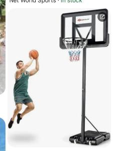 a man dunking a basketball in a hoop at JOHNOATCH APARTMENt in Ibasa