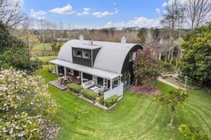 an overhead view of a house with a dome roof at Amore Manor Auckland in Auckland